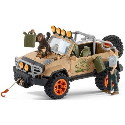 Brinquedo de jipe off-road bege com figuras de macaco e humano