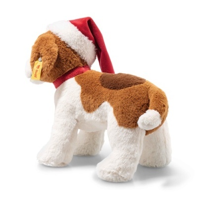 Pelúcia de cão branco e castanho com chapéu de Natal vermelho e colar