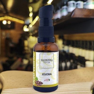 Frasco de óleo vegetal de jojoba da marca Valentina com doseador