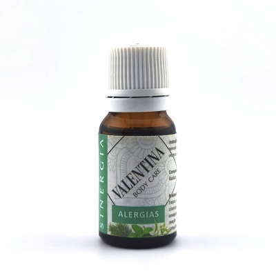 Frasco pequeno de vidro castanho com rótulo verde e branco e tampa branca