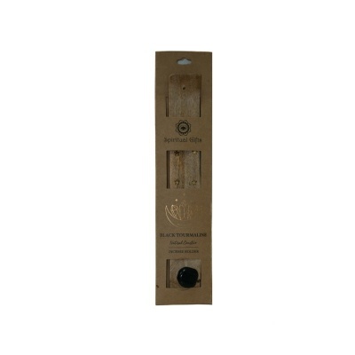 Embalagem castanha com pulseiras e anel de pedra preta e texto visível