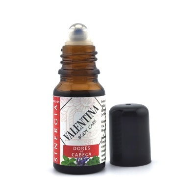 Frasco roll-on de vidro castanho com tampa preta e rótulo branco com texto e imagem de folhas e flores