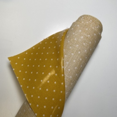 Retalho 27cm x 127cm- Tecido Plastificado - Pintas amarelo torrado
