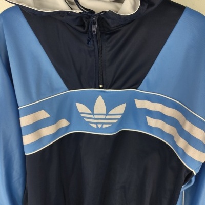 https://www.vsvintagesports.com/product/vintage-adidas-manhattan-hoodie-sweatshirt-m