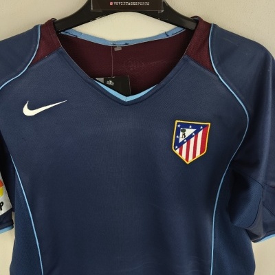 https://www.vsvintagesports.com/product/atletico-madrid-away-shirt-2004-2005-xs