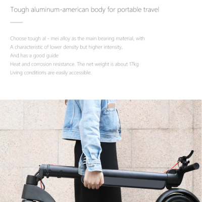 Pessoa segurando um trotinet elétrico dobrado preto com rodas robustas