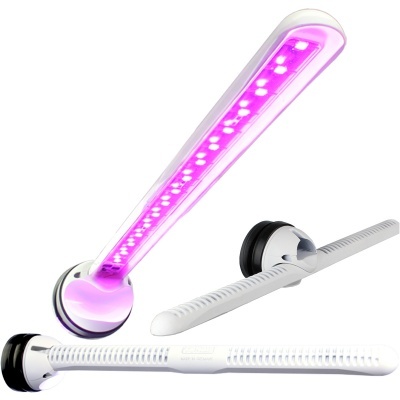 Luzes LED brancas para plantas com luz roxa acesa e base preta