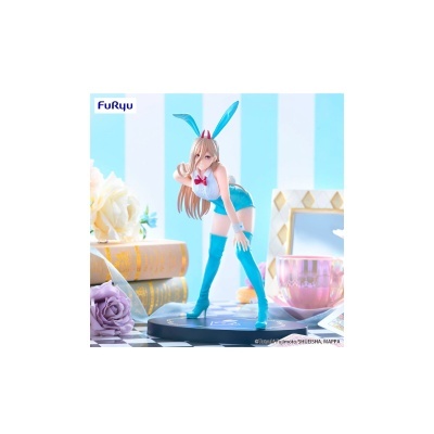 Figura decorativa de personagem feminina com traje azul e orelhas de coelho