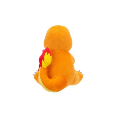Pelúcia Charmander vista de costas com cauda em chamas