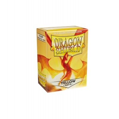 Caixa amarela Dragon Shield com dragão vermelho e texto sobre protetores de cartas