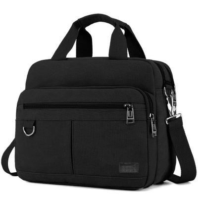 Mala de ombro preta com pegas e bolso frontal