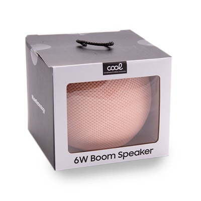 Coluna de som portátil rosa claro em caixa com janela transparente e texto '6W Boom Speaker'