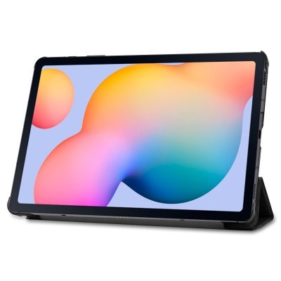 Tablet preto em suporte com ecrã colorido exibindo formas arredondadas coloridas